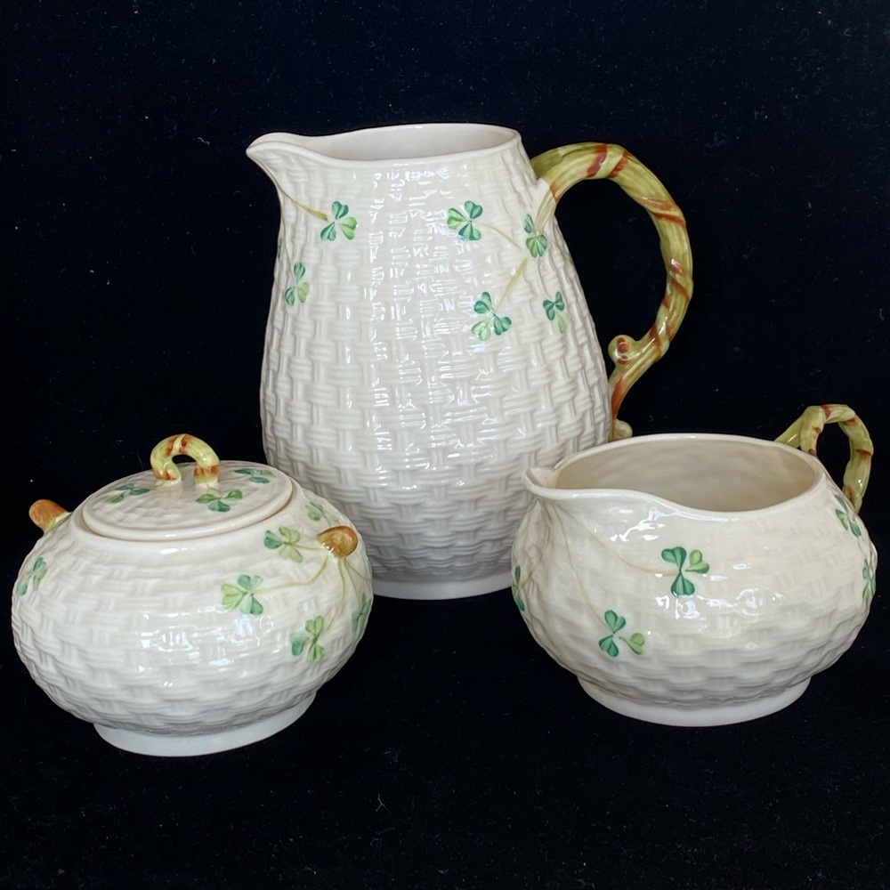 Belleek Pottery  pitcher, creamer and sugar bowl.